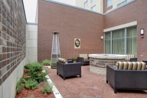 Hotel Courtyard with Brick Wall